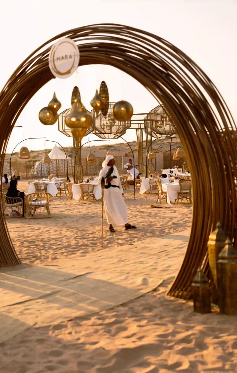 Desert dining experience with elegant Arabian décor and ambient lighting celebrating Ramadan Nights at Nara