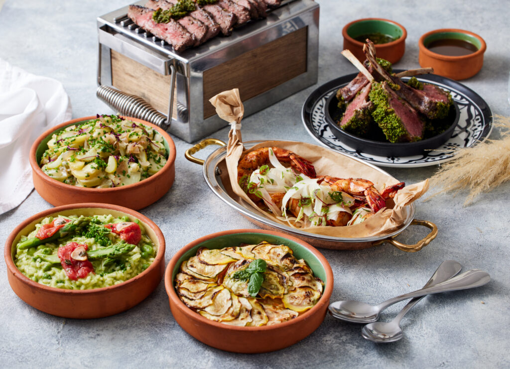 A refined multi-course menu featuring Black Angus beef tagliatta, lamb chops, and more, served at Nara’s luxury desert dining experience in Dubai. 