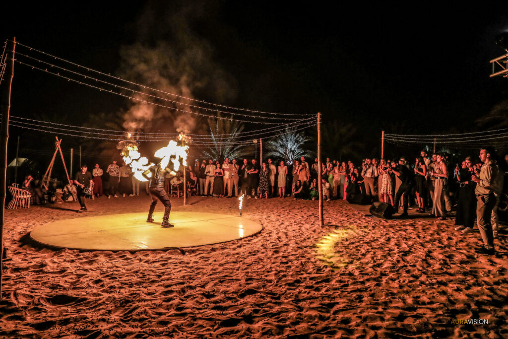 A crowd watching the fire show at Nara Oasis in Dubai. 