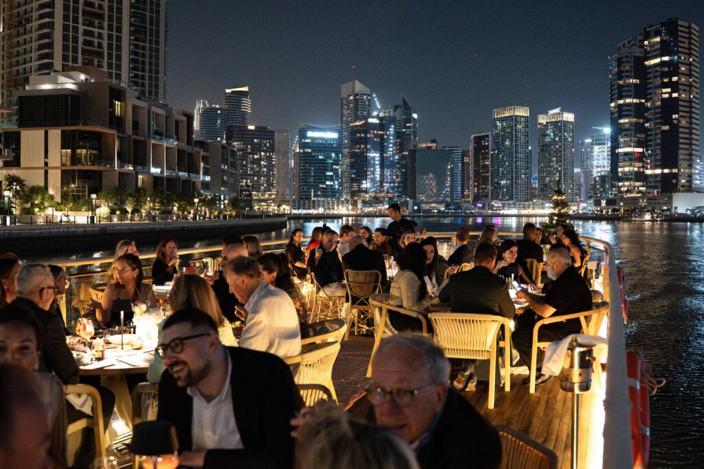 A bustling dinner aboard Lady Nara in Dubai. 